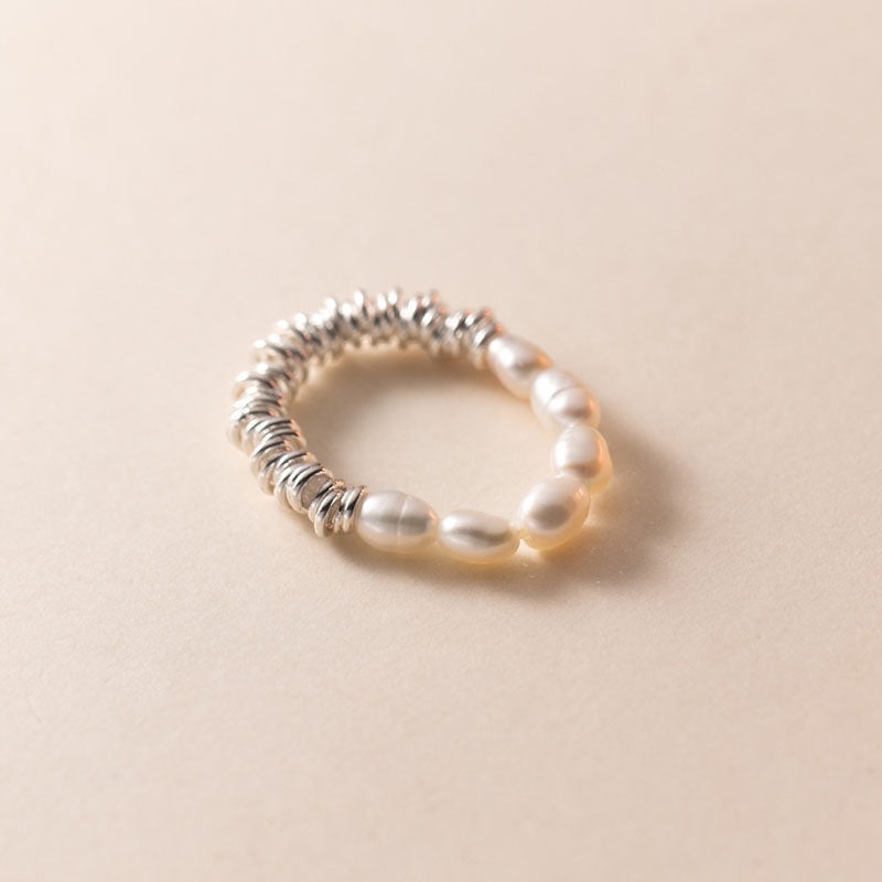 BoxUnboxed Baroque pearl and coiled sterling silver ring with a minimalist design and universal fit.