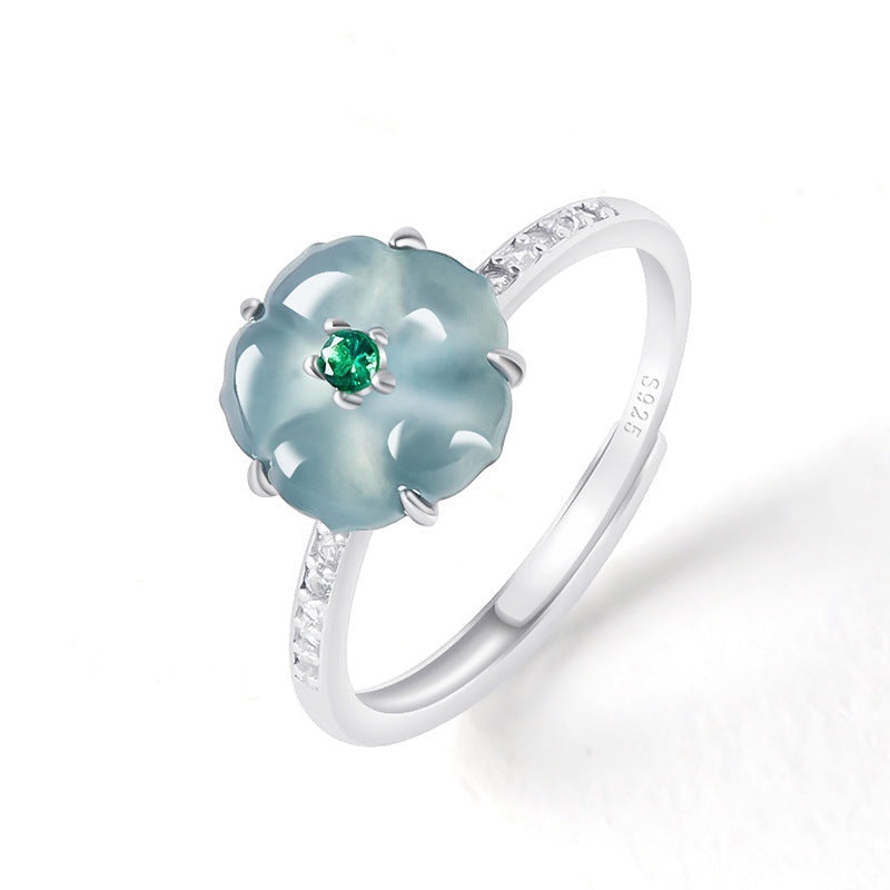 BoxUnboxed adjustable ring featuring a blue water jadeite peach blossom, green accent, and cubic zirconia in platinum.