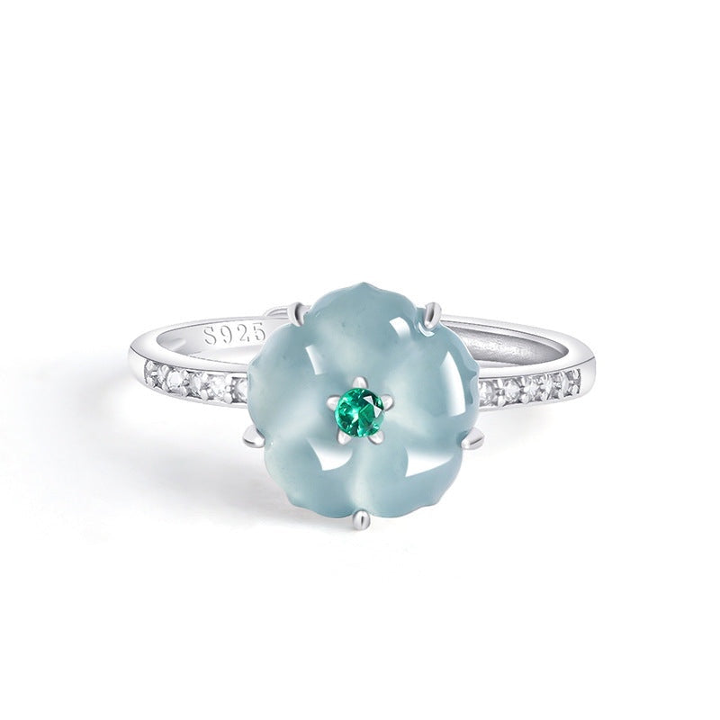 BoxUnboxed adjustable ring featuring a blue water jadeite peach blossom, green accent, and cubic zirconia in platinum.