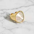 BoxUnboxed gold statement ring with pearlescent inlay and geometric band. Solid 925 sterling silver.